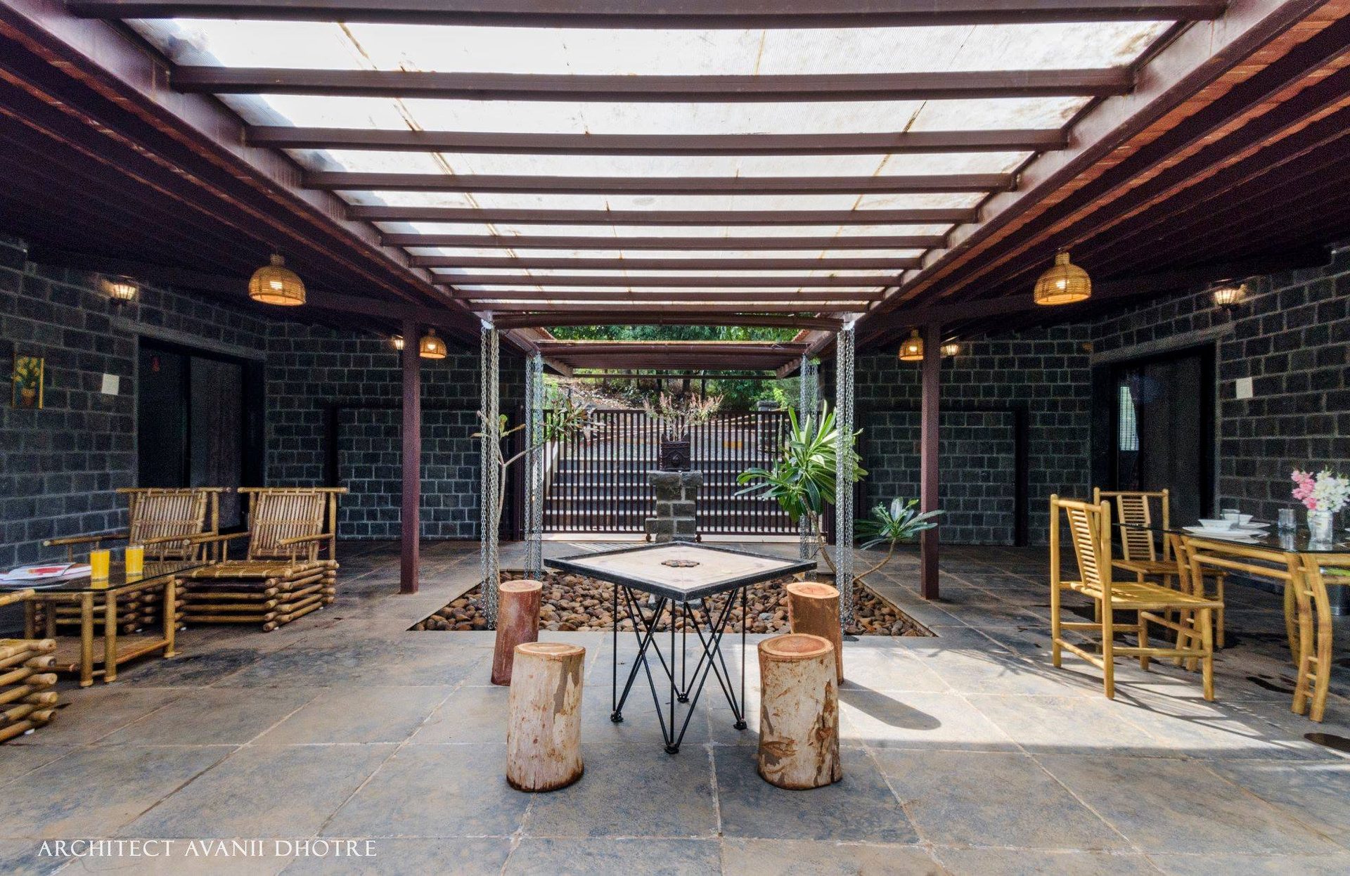 Casuarina Bhor — central courtyard with bamboo and pergola